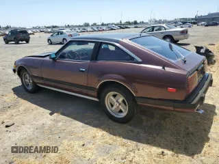 1982 Datsun 280ZX 2+2 z VIN JN1HZ06S5CX429361, wystawiony jako Copart lot #59239365 z przebiegiem 139 002 mil mil oraz Tytuł czysty. Historia ofert i sprzedaży dostępna na DreamBid. Obrazek 2.