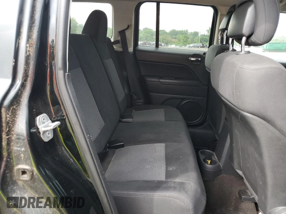 2013 Jeep Patriot Sport z VIN 1C4NJRBB7DD218182, wystawiony jako Copart lot #61376575 z przebiegiem 157 754 mil mil oraz Czysty tytuł • Clean title. Historia ofert i sprzedaży dostępna na DreamBid. Obrazek 10.