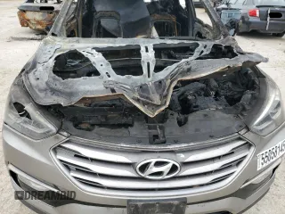 2017 Hyundai Santa Fe 2.4L z VIN 5NMZUDLB0HH042101, wystawiony jako Copart lot #55058145 z przebiegiem Nie podano mil oraz Szkoda całkowita • Salvage title. Historia ofert i sprzedaży dostępna na DreamBid. Obrazek 11.