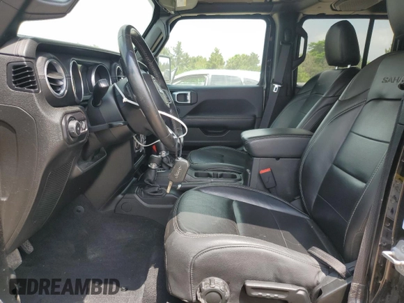 2018 Jeep Wrangler Unlimited Sahara with VIN 1C4HJXEG0JW141101, listed as a Copart auction lot 56573195 with 143,854 mi miles and Salvage title. Bid and sale history available at DreamBid. Image 7.