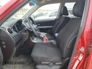 2012 Suzuki Grand Vitara Premium z VIN JS3TD0D20C4101342, wystawiony jako Copart lot #51956595 z przebiegiem 166 710 mil mil oraz Szkody całkowita. Historia ofert i sprzedaży dostępna na DreamBid. Obrazek 7.