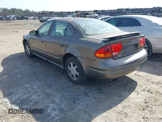 2002 Oldsmobile Alero GL1 z VIN 1G3NL52E82C172314, wystawiony jako IAAI lot #41465789 z przebiegiem 118 427 mil mil oraz . Historia ofert i sprzedaży dostępna na DreamBid. Obrazek 3.