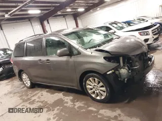 2011 Toyota Sienna LE with VIN 5TDJK3DC2BS013045, listed as a IAAI auction lot 41127037 with 239,401 mi miles. Bid and sale history available at carsss.com. Image 14.