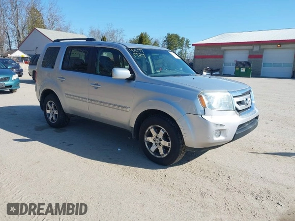 2011 Honda Pilot Touring with VIN 5FNYF4H96BB012122, listed as a IAAI auction lot 42071924 with 211,000 mi miles. Bid and sale history available at carsss.com. Image 1.