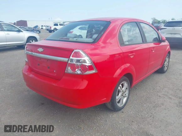 2011 Chevrolet Aveo 1LT with VIN KL1TD5DE1BB144692, listed as a IAAI auction lot 41908565 with 104,691 mi miles and . Bid and sale history available at DreamBid. Image 4.
