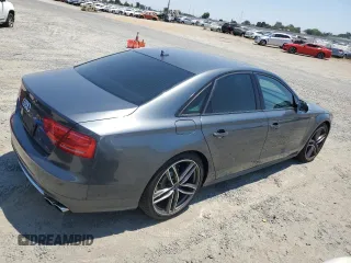 2013 Audi S8 with VIN WAUD2AFD7DN027777, listed as a Copart auction lot 62482694 with 128,383 mi miles and Salvage Title. Bid and sale history available at carsss.com. Image 3.