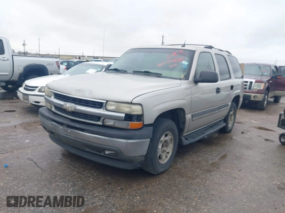 2005 Chevrolet Tahoe LT with VIN 1GNEC13T65R153663, listed as a IAAI auction lot 41425751 with 283,051 mi miles and . Bid and sale history available at DreamBid. Image 2.