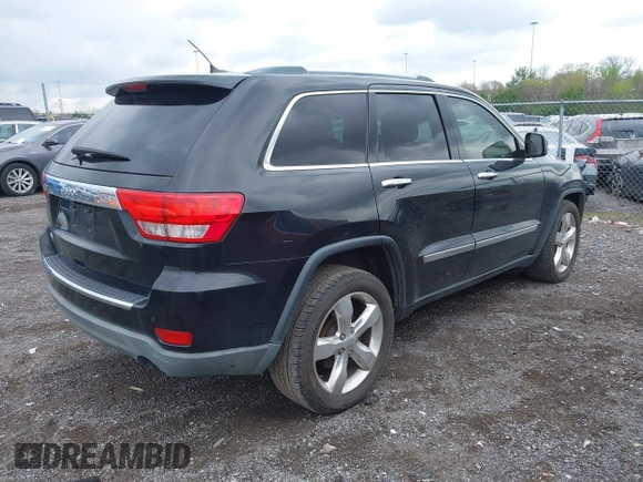 2012 Jeep Grand Cherokee Overland with VIN 1C4RJECT3CC281835, listed as a IAAI auction lot 41994148 with 145,741 mi miles. Bid and sale history available at carsss.com. Image 4.