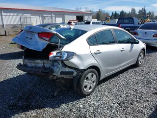 2017 Kia Forte LX with VIN 3KPFK4A7XHE018418, listed as a IAAI auction lot 41874292 with 87,608 mi miles. Bid and sale history available at carsss.com. Image 4.