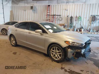 2015 Ford Fusion SE z VIN 3FA6P0HD7FR277787, wystawiony jako IAAI lot #41429014 z przebiegiem 146 826 mil mil oraz . Historia ofert i sprzedaży dostępna na DreamBid. Obrazek 1.