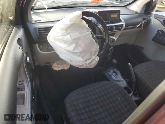 2013 Scion iQ with VIN JTNJJXB00DJ022017, listed as a Copart auction lot 82717994 with Not provided miles and Salvage title. Bid and sale history available at DreamBid. Image 8.