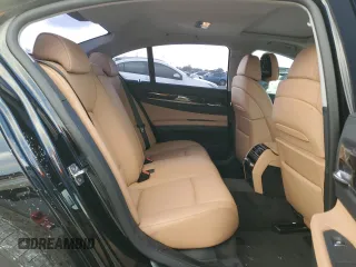 2011 BMW 7 Series 740i with VIN WBAKA4C59BC392351, listed as a Copart auction lot 84942304 with 76,874 mi miles and Salvage Title. Bid and sale history available at carsss.com. Image 10.