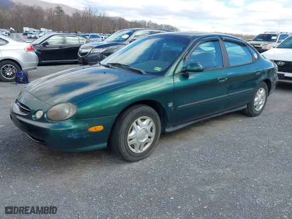 1999 Ford Taurus SE with VIN 1FAFP53S5XA102534, listed as a IAAI auction lot 41740212 with 154,926 mi miles. Bid and sale history available at carsss.com. Image 2.