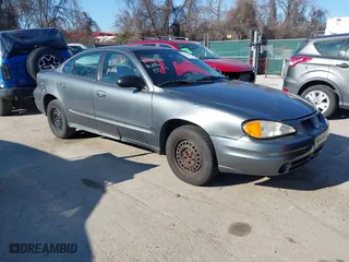 2004 Pontiac Grand Am SE with VIN 1G2NE52F54M560234, listed as a IAAI auction lot 41716361 with 256,571 mi miles. Bid and sale history available at carsss.com. Image 1.