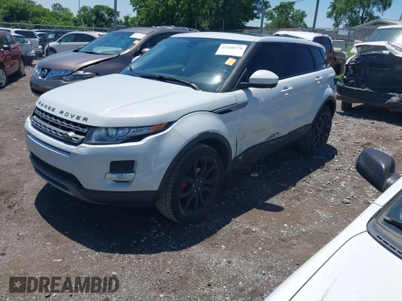 2015 Land Rover Range Rover Evoque Pure Premium z VIN SALVR2BG2FH075464, wystawiony jako IAAI lot #42268278 z przebiegiem 135 426 mil mil oraz . Historia ofert i sprzedaży dostępna na DreamBid. Obrazek 18.