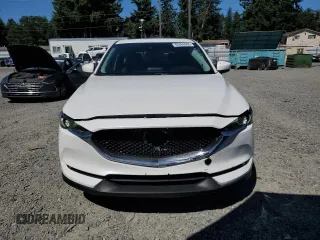 2018 Mazda CX-5 Grand Touring with VIN JM3KFBDM0J0419989, listed as a Copart auction lot 62868005 with 120,217 mi miles and Salvage title. Bid and sale history available at DreamBid. Image 5.