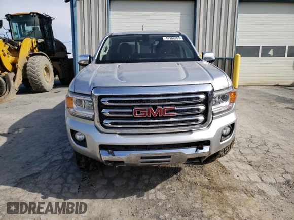 2017 GMC Canyon 4WD SLT with VIN 1GTP6DE13H1176973, listed as a Copart auction lot 46206954 with 99,050 mi miles and Salvage Title. Bid and sale history available at carsss.com. Image 5.