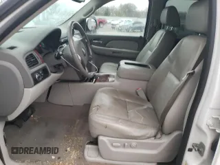 2009 Chevrolet Suburban LTZ with VIN 1GNFC36019J122990, listed as a Copart auction lot 79067174 with 167,632 mi miles and Salvage title. Bid and sale history available at DreamBid. Image 7.