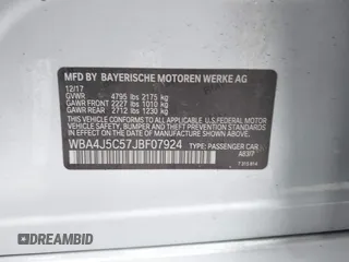 2018 BMW 4 Series 440i with VIN WBA4J5C57JBF07924, listed as a IAAI auction lot 41595682 with 75,121 mi miles and . Bid and sale history available at DreamBid. Image 9.