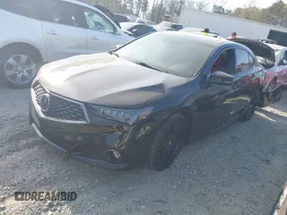 2019 Acura TLX w/A-Spec Pkg z VIN 19UUB3F60KA002600, wystawiony jako IAAI lot #41894449 z przebiegiem 54 816 mil mil oraz . Historia ofert i sprzedaży dostępna na DreamBid. Obrazek 2.