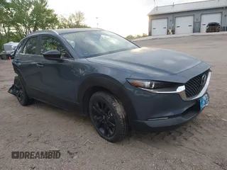 2023 Mazda CX-30 S Carbon Edition with VIN 3MVDMBCM4PM577619, listed as a IAAI auction lot 42219801 with 24,784 mi miles and . Bid and sale history available at DreamBid. Image 1.