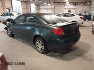 2006 Pontiac G6 6-Cyl z VIN 1G2ZG558664233613, wystawiony jako IAAI lot #41075907 z przebiegiem 228 361 mil mil oraz . Historia ofert i sprzedaży dostępna na DreamBid. Obrazek 3.