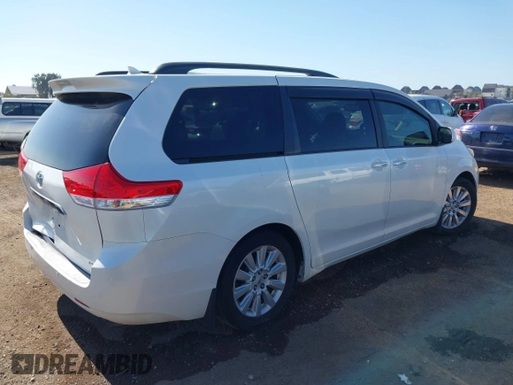 2011 Toyota Sienna XLE AAS with VIN 5TDYK3DCXBS097582, listed as a IAAI auction lot 42233594 with 226,902 mi miles and . Bid and sale history available at DreamBid. Image 4.