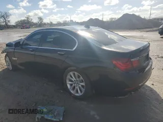2014 BMW 7 Series 740i with VIN WBAYA6C54ED144416, listed as a Copart auction lot 74846184 with 0 mi miles and Salvage Title. Bid and sale history available at carsss.com. Image 2.