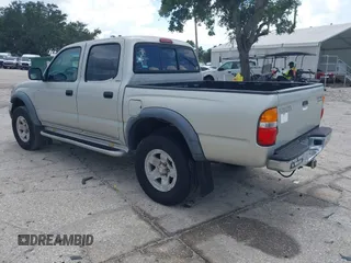 2004 Toyota Tacoma PreRunner z VIN 5TEGN92N74Z411950, wystawiony jako IAAI lot #42536808 z przebiegiem 201 453 mil mil oraz . Historia ofert i sprzedaży dostępna na DreamBid. Obrazek 3.