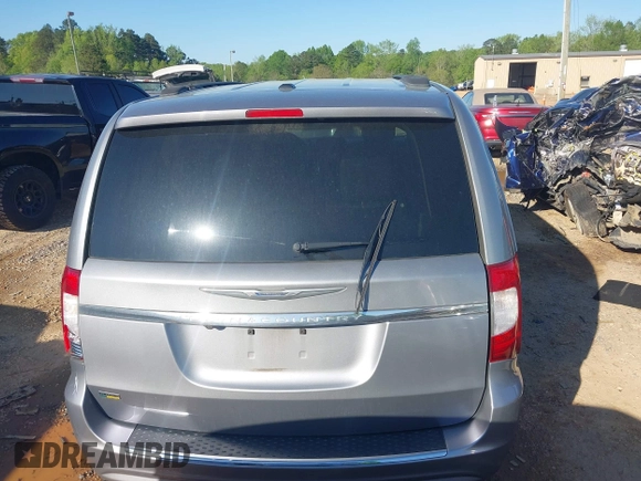 2015 Chrysler Town & Country Touring with VIN 2C4RC1BG9FR715307, listed as a IAAI auction lot 41988281 with 164,167 mi miles. Bid and sale history available at carsss.com. Image 16.