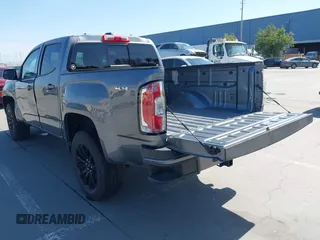 2022 GMC Canyon 4WD Elevation z VIN 1GTG6CENXN1304361, wystawiony jako IAAI lot #41990960 z przebiegiem 23 151 mil mil oraz . Historia ofert i sprzedaży dostępna na DreamBid. Obrazek 3.