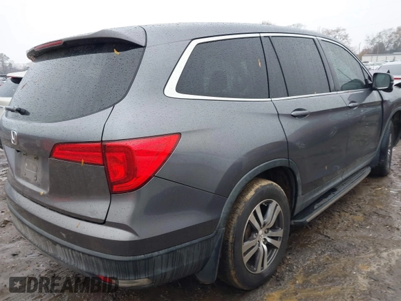 2017 Honda Pilot EX-L with VIN 5FNYF5H8XHB018480, listed as a IAAI auction lot 41049028 with 136,748 mi miles and . Bid and sale history available at DreamBid. Image 4.