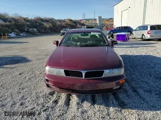 1998 Mitsubishi Diamante LS with VIN 6MMAP57P9WT007574, listed as a Copart auction lot 85813234 with 134,695 mi miles and Salvage Title. Bid and sale history available at carsss.com. Image 11.