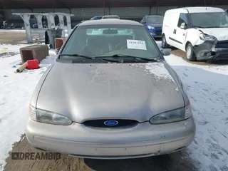 1996 Ford Contour LX с VIN 1FALP6530TK105053, выставлен на аукционе IAAI как лот 41287231 с пробегом 115 177 миль миль и . История ставок и продаж доступна на DreamBid. Изображение 12.