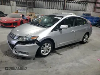 2010 Honda Insight EX z VIN JHMZE2H75AS003910, wystawiony jako Copart lot #56485995 z przebiegiem 104 685 mil mil oraz Szkoda całkowita • Salvage title. Historia ofert i sprzedaży dostępna na DreamBid. Obrazek 1.