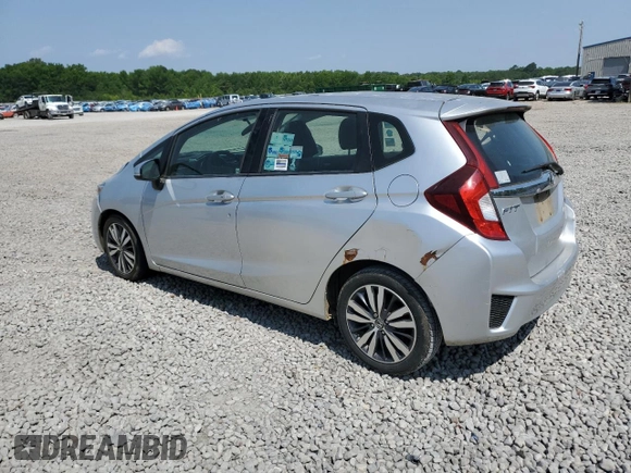 2015 Honda Fit EX-L with VIN 3HGGK5H84FM708209, listed as a Copart auction lot 59337085 with 130,355 mi miles and Salvage title. Bid and sale history available at DreamBid. Image 2.