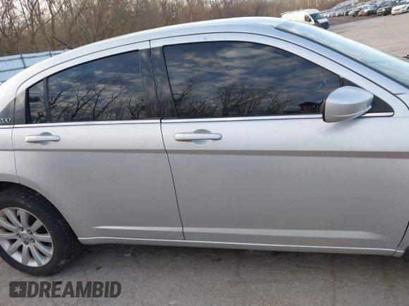 2012 Chrysler 200 Touring with VIN 1C3CCBBB8CN210825, listed as a IAAI auction lot 41828224 with 129,966 mi miles. Bid and sale history available at carsss.com. Image 13.