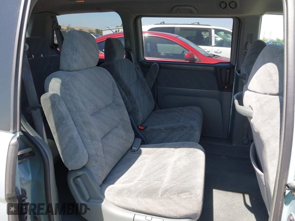 2003 Honda Odyssey EX with VIN 2HKRL18633H502246, listed as a IAAI auction lot 42414427 with 251,759 mi miles and . Bid and sale history available at DreamBid. Image 8.