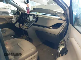2015 Toyota Sienna XLE with VIN 5TDYK3DCXFS534633, listed as a IAAI auction lot 42018593 with 128,421 mi miles. Bid and sale history available at carsss.com. Image 5.