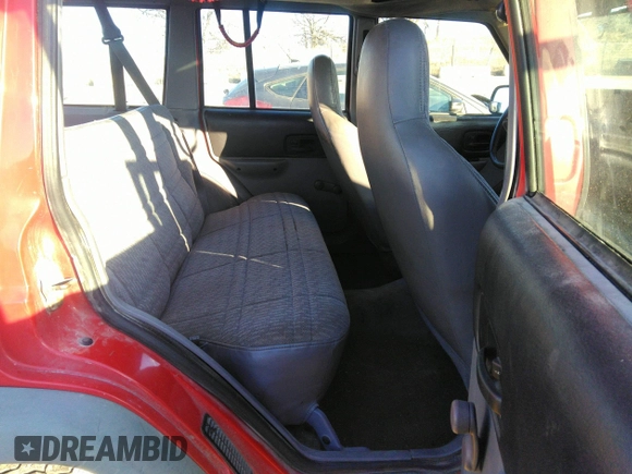 1997 Jeep Cherokee SE z VIN 1J4FJ28S4VL559673, wystawiony jako IAAI lot #41120546 z przebiegiem 272 358 mil mil oraz . Historia ofert i sprzedaży dostępna na DreamBid. Obrazek 8.