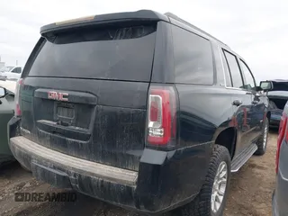 2016 GMC Yukon SLE with VIN 1GKS2AKC2GR357481, listed as a IAAI auction lot 41715909 with 165,377 mi miles. Bid and sale history available at carsss.com. Image 4.