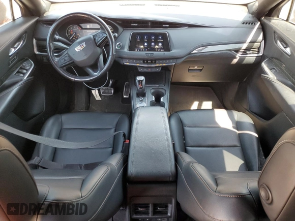 2019 Cadillac XT4 AWD Sport with VIN 1GYFZFR42KF136567, listed as a Copart auction lot 52018445 with 99,944 mi miles and Salvage title. Bid and sale history available at DreamBid. Image 8.
