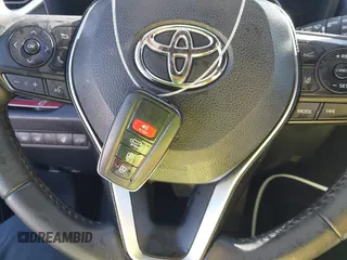 2021 Toyota RAV4 Hybrid XSE with VIN 4T3E6RFV5MU057078, listed as a IAAI auction lot 41718381 with 65,797 mi miles. Bid and sale history available at carsss.com. Image 11.