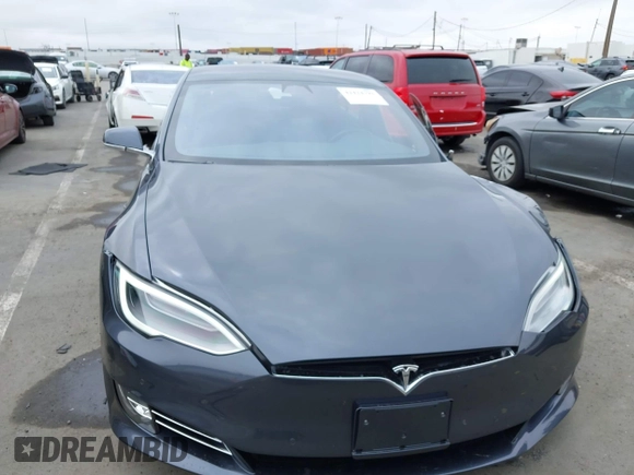 2017 Tesla Model S 100D with VIN 5YJSA1E20HF228681, listed as a IAAI auction lot 42424793 with Not provided miles and . Bid and sale history available at DreamBid. Image 12.