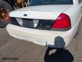 2010 Ford Crown Victoria with VIN 2FABP7AV6AX138688, listed as a IAAI auction lot 41774614 with 999,999 mi miles. Bid and sale history available at carsss.com. Image 15.