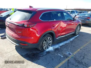 2021 Mazda CX-9 Signature with VIN JM3TCBEY7M0529957, listed as a IAAI auction lot 41388923 with 69,919 mi miles. Bid and sale history available at carsss.com. Image 4.
