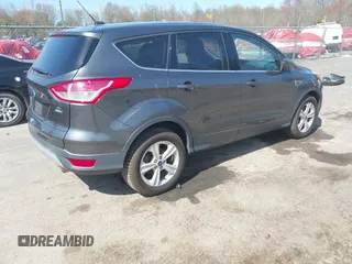 2016 Ford Escape SE with VIN 1FMCU9GX6GUB25849, listed as a IAAI auction lot 42087346 with 189,909 mi miles. Bid and sale history available at carsss.com. Image 4.