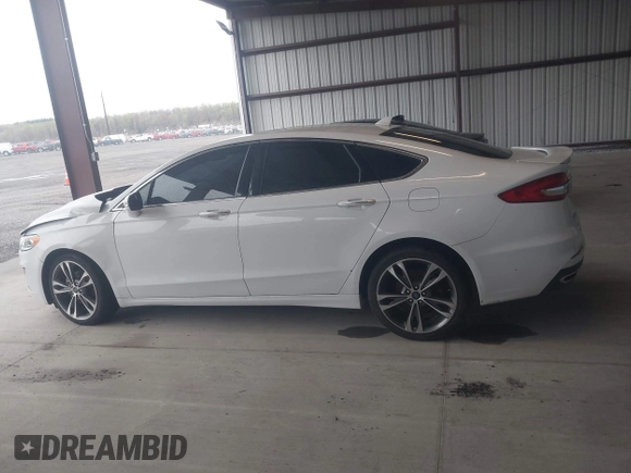 2019 Ford Fusion Titanium with VIN 3FA6P0K95KR271291, listed as a IAAI auction lot 41983320 with 71,962 mi miles and . Bid and sale history available at DreamBid. Image 14.