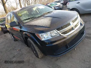 2015 Dodge Journey SE z VIN 3C4PDCAB4FT712432, wystawiony jako IAAI lot #41111312 z przebiegiem 271 895 mil mil oraz . Historia ofert i sprzedaży dostępna na DreamBid. Obrazek 1.