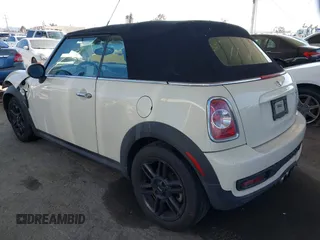2014 MINI Convertible S with VIN WMWZP3C5XET706911, listed as a IAAI auction lot 42217410 with 54,649 mi miles and . Bid and sale history available at DreamBid. Image 3.